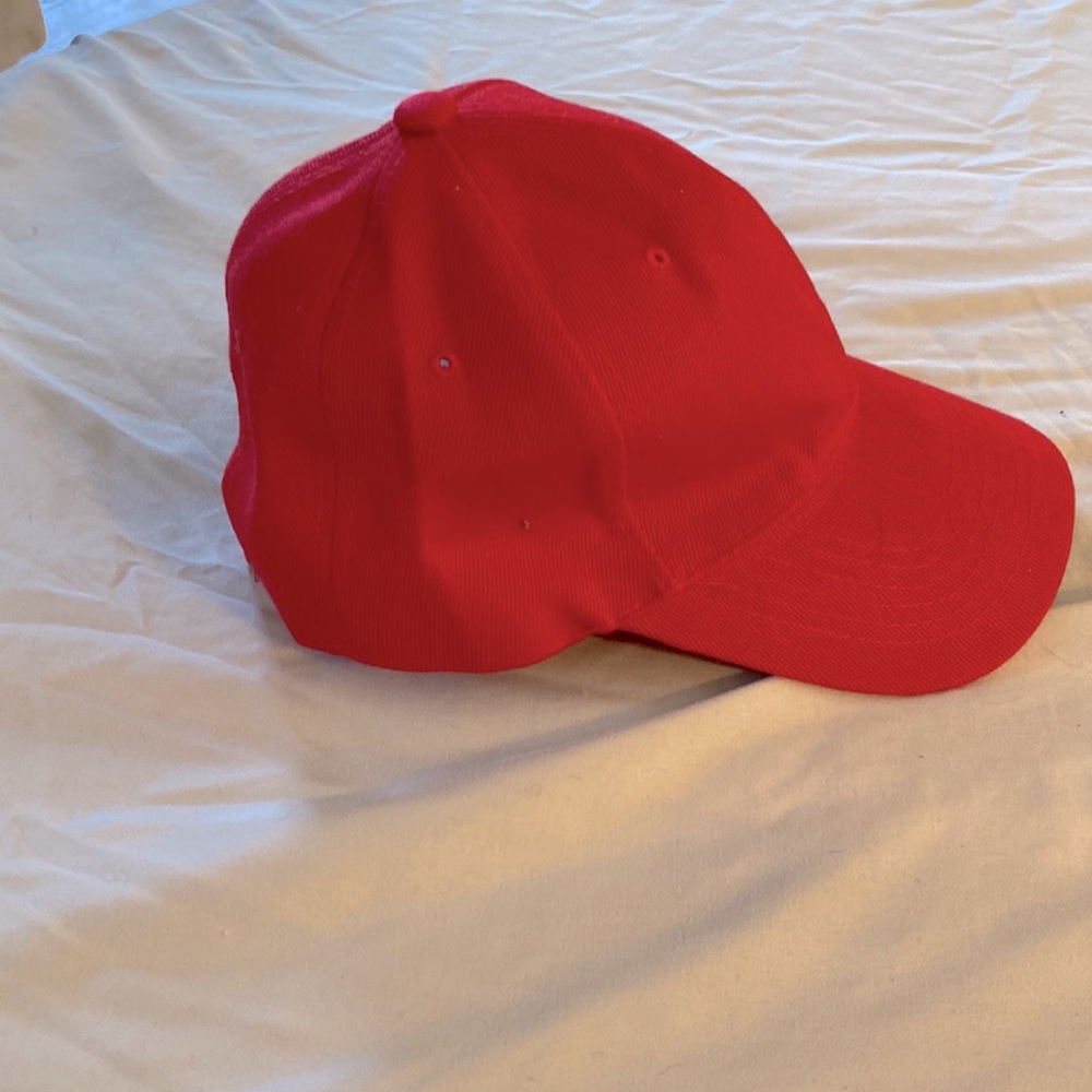 No brand - bright red ball cap, never worn, perfect condition.